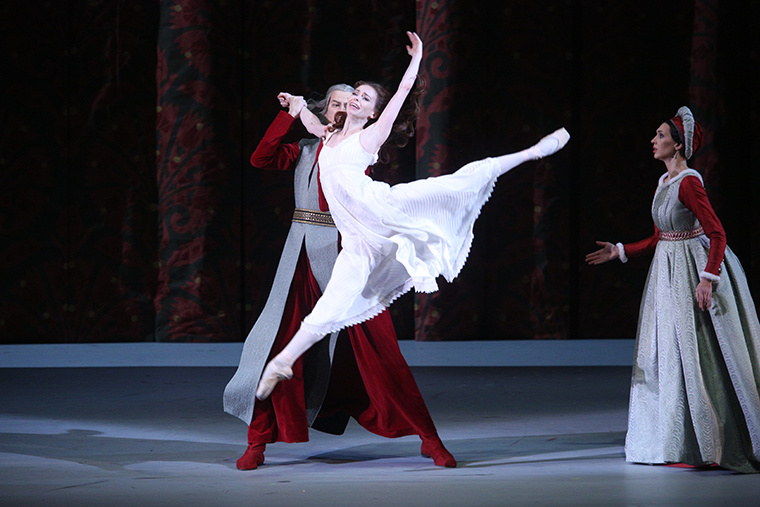 Ekaterina Krysanova as Juliet, Nikita Elikarov as Lord Capulet,<br>Kristina Karasyova as Lady Capulet. Photo by Elena Fetisova.